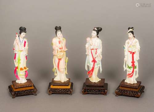 Four late 19th/early 20th century Chinese carved ivory figurines Each modelled as Guanyin,