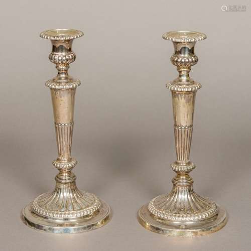 A pair of George III loaded silver candlesticks, hallmarked Sheffield 1813,