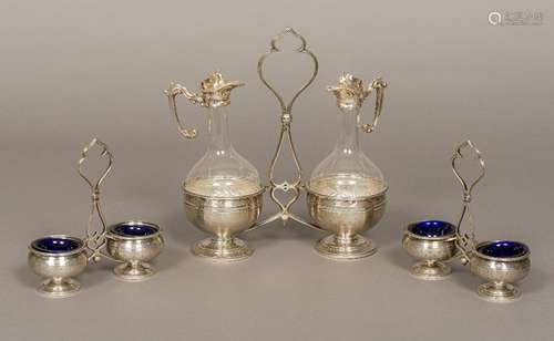 A 19th century French silver and glass condiment set Comprising: a double bottle stand with two