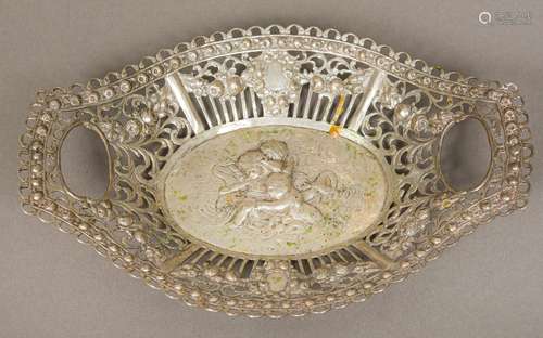 A Continental 800 silver basket Centrally worked with putti wrestling a dolphin. 22.5 cm wide.