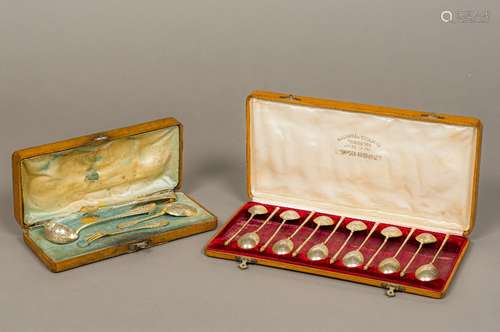 A Russian cased set of late 19th century silver gilt coffee spoons,