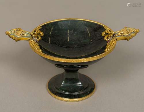 A silver gilt mounted carved hardstone pedestal tazza The mounts set with small diamonds and