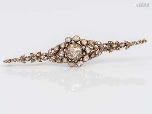 An antique Dutch 14 ct gold and unmarked white metal diamond set bar brooch with oak leaf