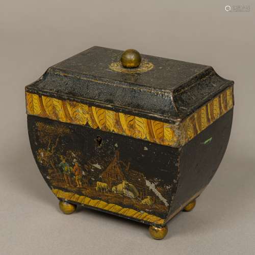 A 19th century toleware tea caddy The hinged top with lacquered brass finial,