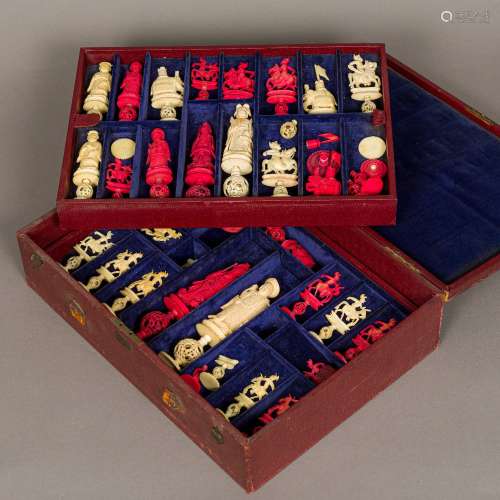 A late 19th/early 20th century carved and stained ivory chess set Each piece intricately carved,