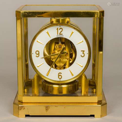 A LeCoultre Atmos clock Of typical form, with lacquer brass case,