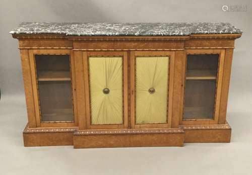 A 19th century variegated marble topped burr maple dwarf breakfront bookcase The shaped topped