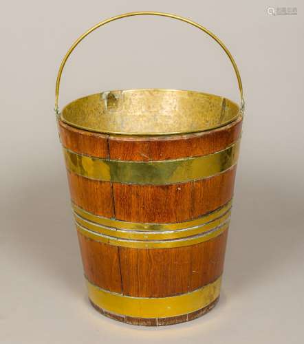 A 19th century brass bound mahogany bucket Of tapering cylindrical form,