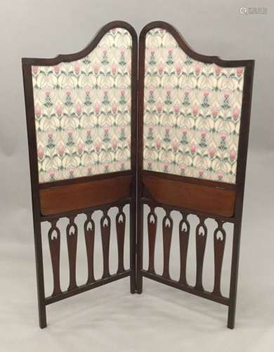 An Edwardian mahogany framed single fold screen The shaped fabric lined panels with integral hinged