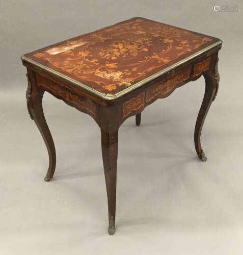 A Continental marquetry inlaid card table The baize lined fold over top above an end frieze drawer