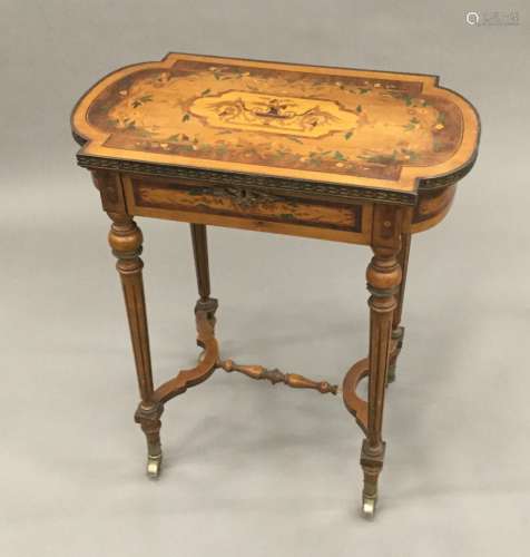 A Continental marquetry inlaid side table The hinged mirror inset shaped top enclosing a fitted
