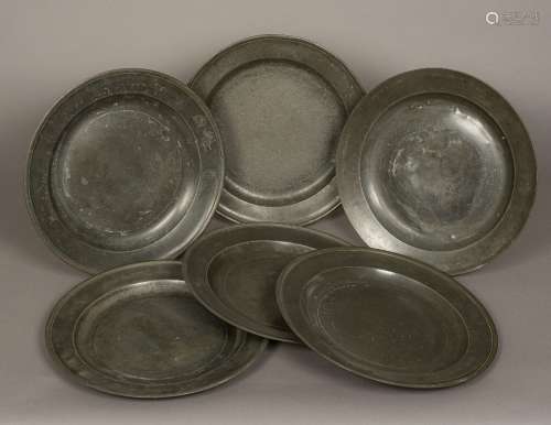 A set of six pewter chargers,