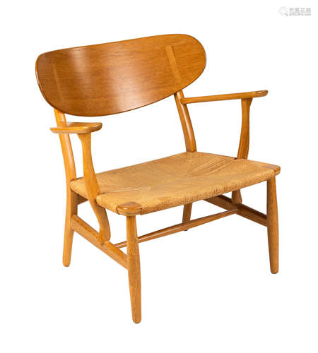 Hans J. Wegner (Danish, 1914-2007)Lounge Chair Model CH22. Carl Hansen & Son Denmark, 1951 oak,