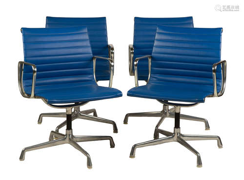 Four Charles and Ray Eames Office Chairs. For Herman Miller. A set of four office chairs with blue