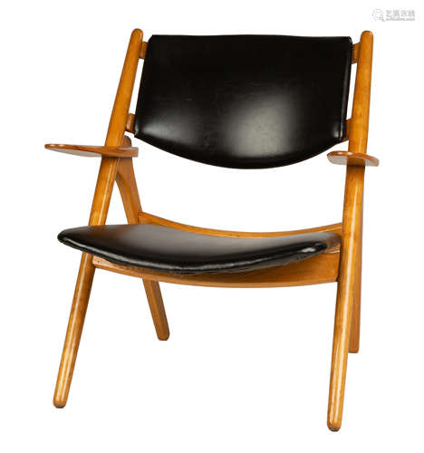 Hans J. Wegner (Danish, 1914-2007) The Sawback Chair. Designed in 1951. Ash and leather. Ht. 31