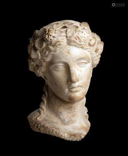 Marble Head of Dionysos. Roman Imperial, Hadrianic, 1st half of 2nd century AD, after an early 4th