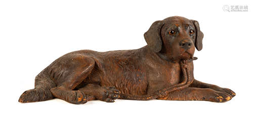 Carved Black Forest Dog. Circa 1900. Glass eyes. Original patina, some wear to edges. L 21