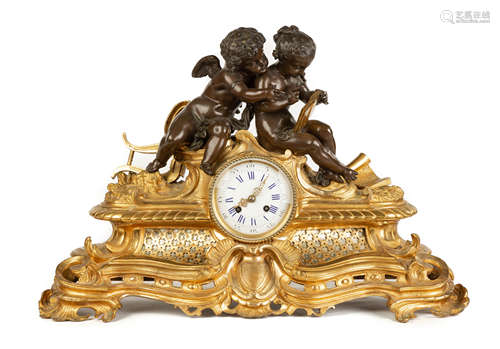 French Gilt Bronze Cherub Clock. 19th century with musical theme. Hand painted porcelain dial. 8 day