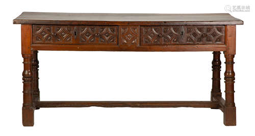 17th Century Spanish Baroque Table. Continental. Walnut, with relief carving and turned legs on a