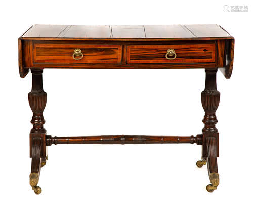 Regency Sofa Table. Circa 1815. Figured solid calamander top, mahogany base with fluted posts,