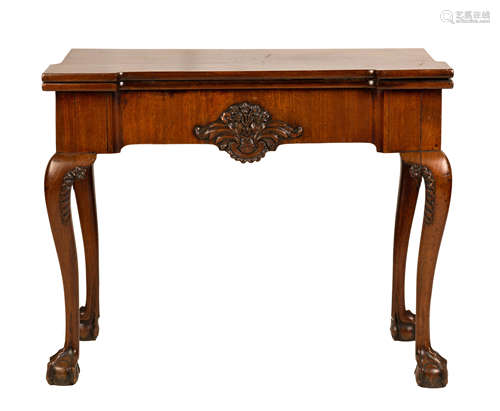 George II Mahogany Game Table. 18th century, possibly Irish. Mahogany with claw and ball feet,