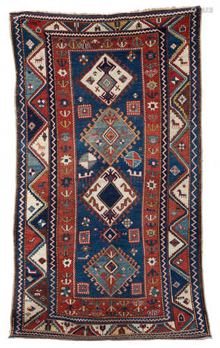 Kazak. Late 19th century with animal decoration. Even wear. 8' 5