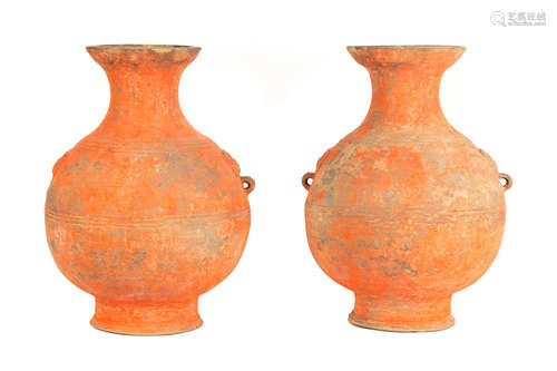 Pair of Chinese Han Dynasty (206 BC-220 AD) Terracotta Hu Form Vessels. Original painted surface.