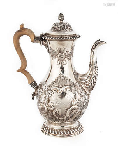 Georgian Silver Coffee Pot. 19th century, with hand chased design and coat of arms. 30 ozt. Ht. 11