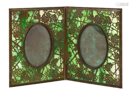 Tiffany Studios, NY Double Picture Frame. Bronze and favrille glass. Brownish green patina.