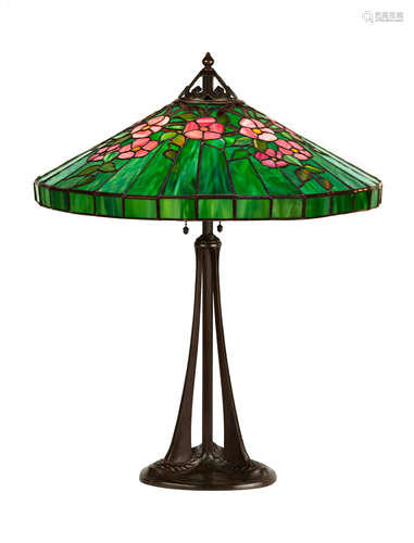 Handel Leaded Floral Lamp. Early 20th century. Brown patinaed base. Base signed 'Handel'. Couple