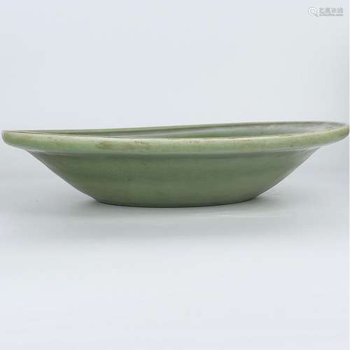 A LONGQUAN-GLAZED DRAGON DISH.MING PERIOD