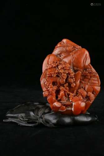 A CARVED RED AGATE  BOULDER.