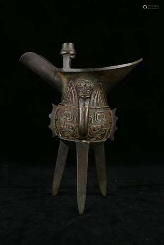 A BRONZE RITUAL TRIPOD WING VESSEL.ANTIQUE