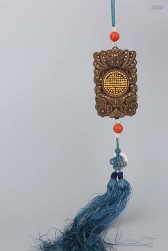 A CARVED ALOESWOOD PENDANT.QING PERIOD