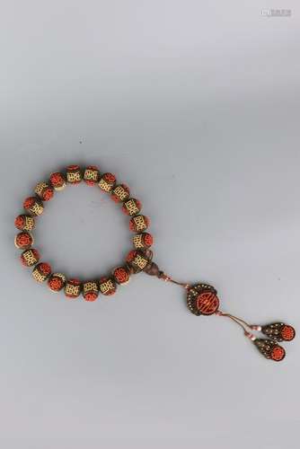 AN ALOESWOOD BRACELET.