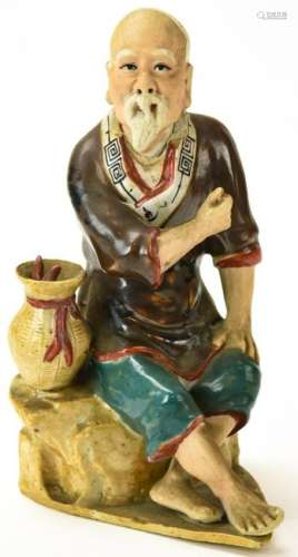Chinese Glazed Stoneware Statue of a Seated Man