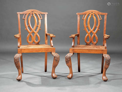 Pair of Anglo-Colonial Carved Teak Armchairs in the Georgian Taste , late 19th c., arched crest