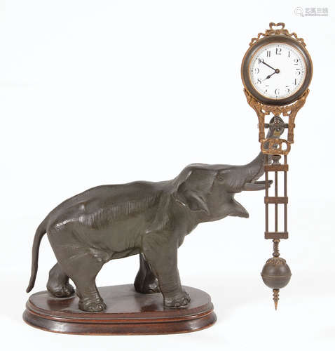 Continental Patinated Metal Figural Swinging Clock , c. 1900, probably Junghans, Germany, 