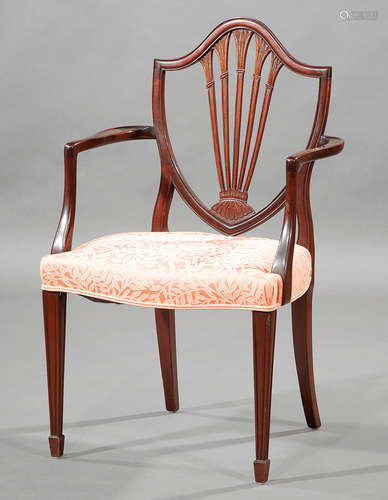 Antique George III-Style Carved Mahogany Armchair , shield back, shaped arms, tapered legs, spade