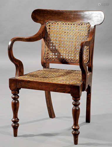 Anglo-Colonial Carved Tropical Hardwood Armchair , 19th c., shaped crest rail, caned back and