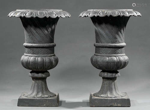 Pair of American Cast Iron Garden Urns , egg-and-dart molded collar, lobed body, square plinth base,