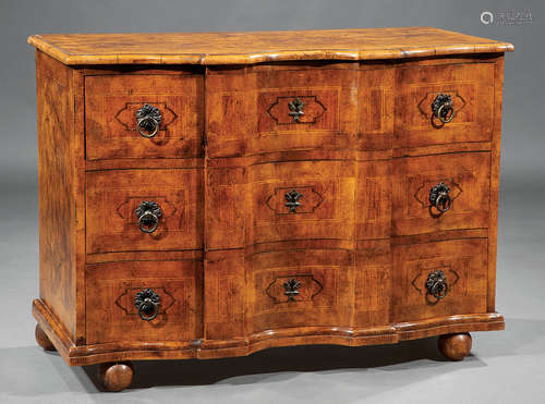 Continental Inlaid and Grain-Painted Hardwood Commode , shaped top, three conforming drawers, bun