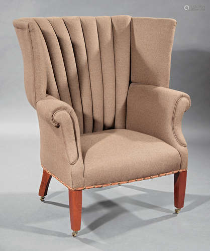 Georgian-Style Mahogany Wing Chair , 20th c., labeled Ralph Lauren, channeled back, scrolled arms,