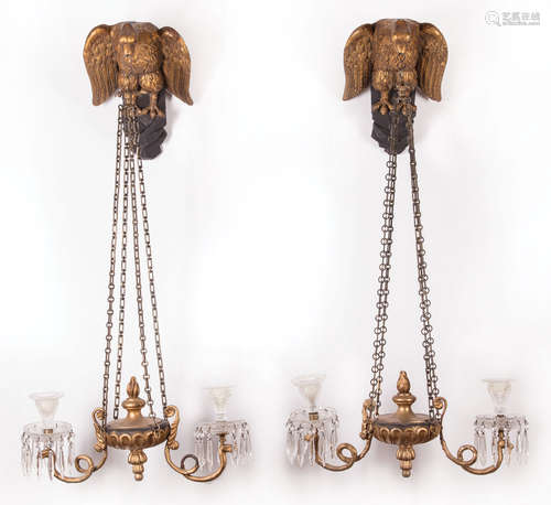 Pair of Continental Carved Gilt and Ebonized Two-Light Sconces , c. 1900, eagle brackets, circle and