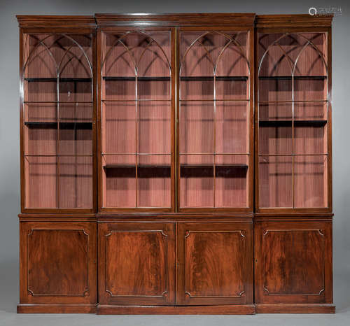 George III Carved Mahogany Breakfront , early 19th c., stepped cornice, Gothicized doors, shelf