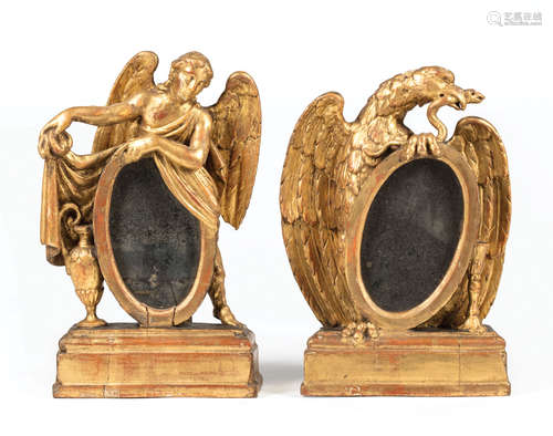 Pair of Continental Giltwood Shelf Mirrors , late 18th/early 19th c., eagle with serpent and