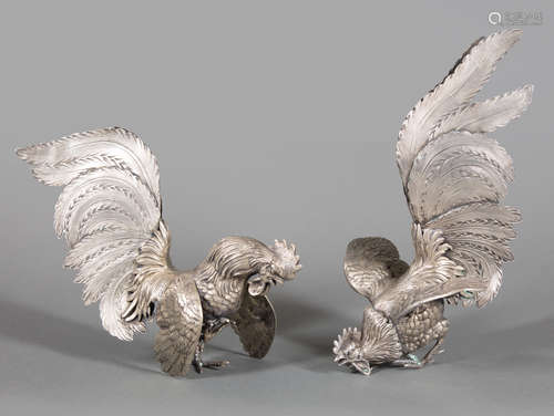 Pair of Alpaca Fighting Rooster Garniture Figures , h. (tallest) 11 5/8 in . Provenance: Estates