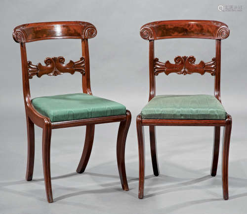 Suite of Four American Late Classical Carved Mahogany Side Chairs , mid-19th c., scrolled crest