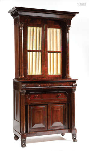 American Classical Carved Mahogany Secretary-Bookcase , c. 1835, New York, stepped cornice, arched