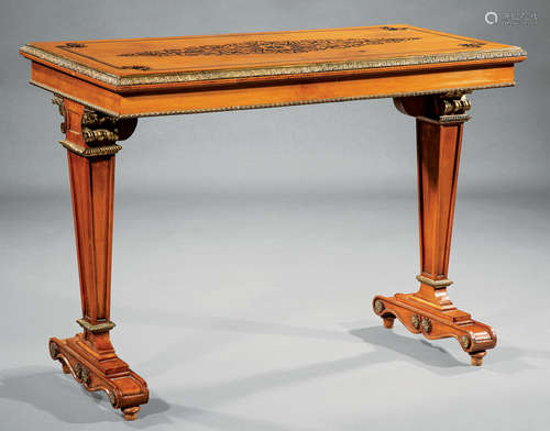 English Bronze-Mounted and Stenciled Satinwood Sofa Table , 19th c., foliate molded edge, tapered